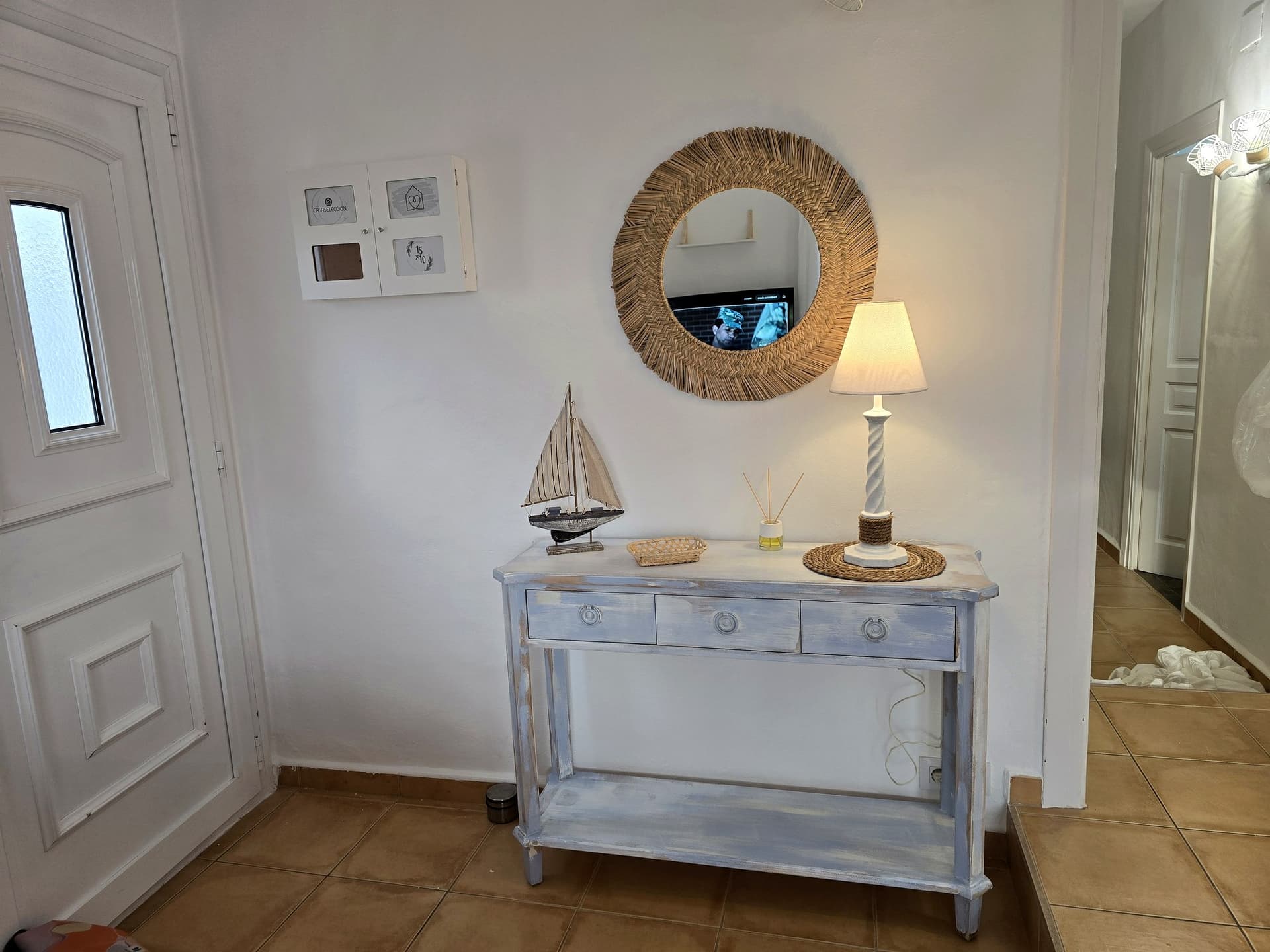 Entrada con detalle marinero — Casa Luca